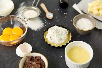 Image showing baking dish with dough and cooking ingredients