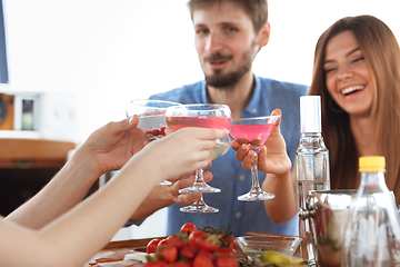 Image showing Group of happy friends drinking vodka cocktails at boat party outdoor, cheerful and happy