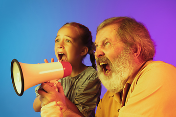 Image showing Senior man, grandfather having fun and spending time together with girl, granddaughter. Joyful elderly lifestyle concept