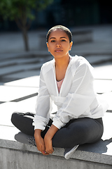 Image showing african american woman in sports clothes outdoors