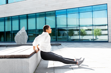 Image showing african american woman doing sports outdoors