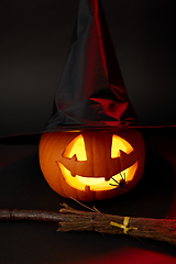 Image showing halloween jack-o-lantern in witch's hat and broom