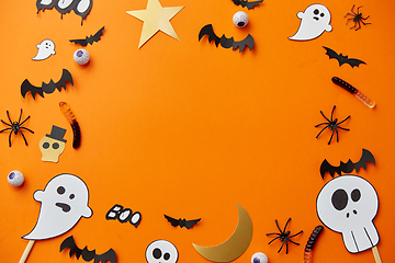 Image showing halloween party paper decorations and sweets