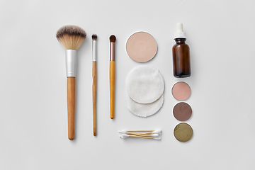 Image showing make up brushes, cosmetics and cotton swabs