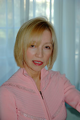 Image showing Blonde Woman Pink Sweater