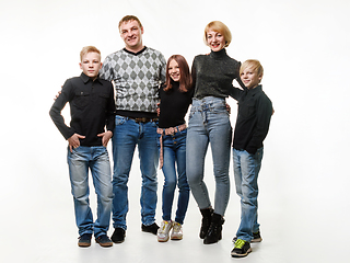 Image showing Happy adult large family in casual clothes, full length portrait, isolated on white background