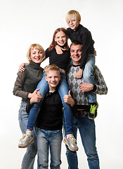 Image showing Portrait of a large family with teenagers in casual clothes on a white background