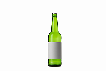 Image showing Empty green colored beer bottle. Isolated on white studio background