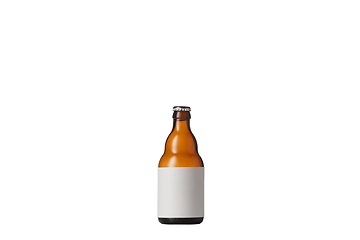 Image showing Empty golden colored beer bottle. Isolated on white studio background