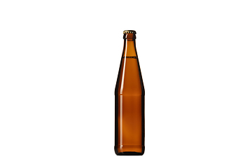 Image showing Empty golden colored beer bottle. Isolated on white studio background