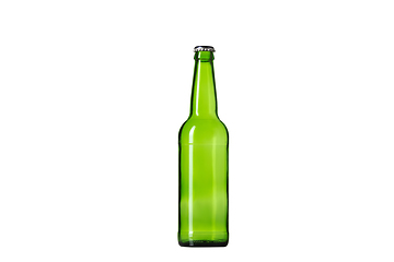 Image showing Empty green colored beer bottle. Isolated on white studio background