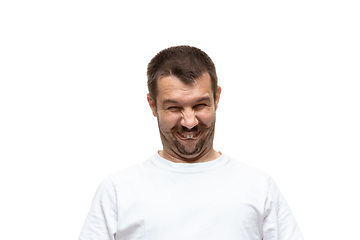 Image showing Young caucasian man with funny, unusual popular emotions and gestures isolated on white studio background