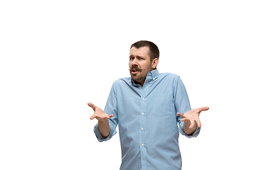 Image showing Young caucasian man with funny, unusual popular emotions and gestures isolated on white studio background