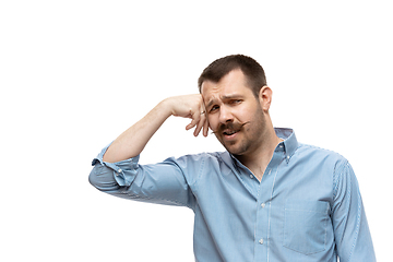 Image showing Young caucasian man with funny, unusual popular emotions and gestures isolated on white studio background