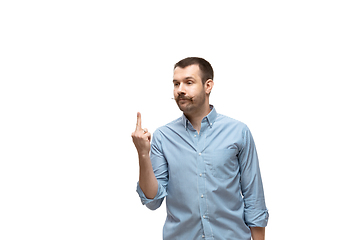 Image showing Young caucasian man with funny, unusual popular emotions and gestures isolated on white studio background