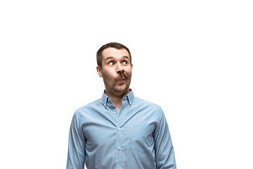 Image showing Young caucasian man with funny, unusual popular emotions and gestures isolated on white studio background