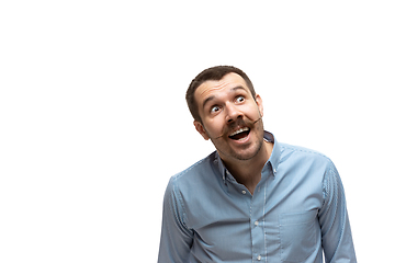 Image showing Young caucasian man with funny, unusual popular emotions and gestures isolated on white studio background