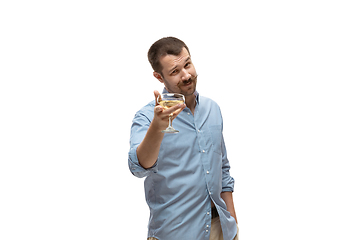 Image showing Young caucasian man with funny, unusual popular emotions and gestures isolated on white studio background