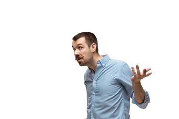 Image showing Young caucasian man with funny, unusual popular emotions and gestures isolated on white studio background