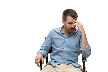 Image showing Young caucasian man with funny, unusual popular emotions and gestures isolated on white studio background