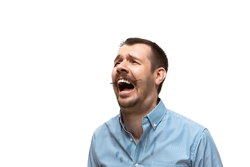 Image showing Young caucasian man with funny, unusual popular emotions and gestures isolated on white studio background