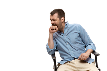 Image showing Young caucasian man with funny, unusual popular emotions and gestures isolated on white studio background