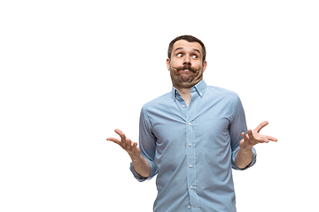 Image showing Young caucasian man with funny, unusual popular emotions and gestures isolated on white studio background