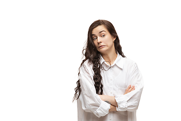 Image showing Young caucasian woman with funny, unusual popular emotions and gestures isolated on white studio background