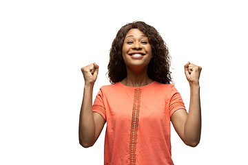 Image showing Young african-american woman with funny, unusual popular emotions and gestures isolated on white studio background