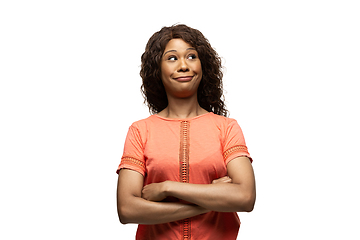 Image showing Young african-american woman with funny, unusual popular emotions and gestures isolated on white studio background