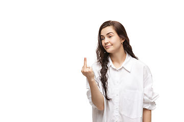 Image showing Young caucasian woman with funny, unusual popular emotions and gestures isolated on white studio background