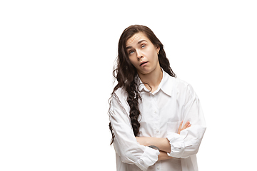 Image showing Young caucasian woman with funny, unusual popular emotions and gestures isolated on white studio background