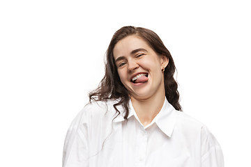 Image showing Young caucasian woman with funny, unusual popular emotions and gestures isolated on white studio background