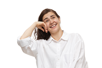 Image showing Young caucasian woman with funny, unusual popular emotions and gestures isolated on white studio background