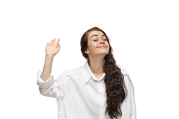 Image showing Young caucasian woman with funny, unusual popular emotions and gestures isolated on white studio background