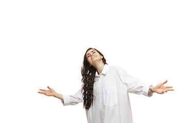 Image showing Young caucasian woman with funny, unusual popular emotions and gestures isolated on white studio background