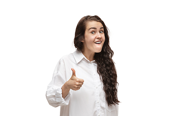 Image showing Young caucasian woman with funny, unusual popular emotions and gestures isolated on white studio background