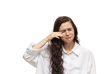 Image showing Young caucasian woman with funny, unusual popular emotions and gestures isolated on white studio background