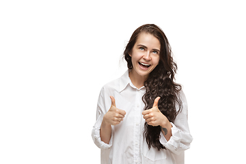 Image showing Young caucasian woman with funny, unusual popular emotions and gestures isolated on white studio background