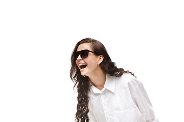 Image showing Young caucasian woman with funny, unusual popular emotions and gestures isolated on white studio background