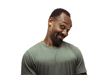 Image showing Young african-american man with funny, unusual popular emotions and gestures isolated on white studio background