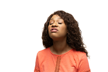 Image showing Young african-american woman with funny, unusual popular emotions and gestures isolated on white studio background