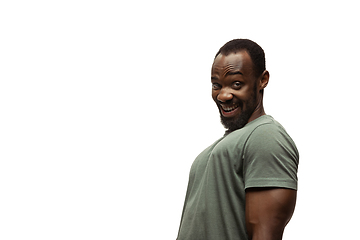 Image showing Young african-american man with funny, unusual popular emotions and gestures isolated on white studio background