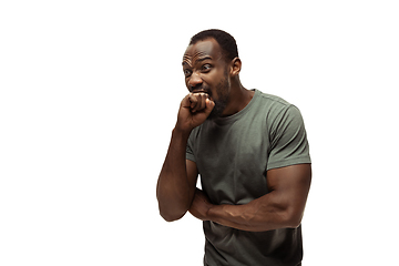 Image showing Young african-american man with funny, unusual popular emotions and gestures isolated on white studio background