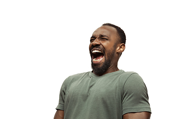 Image showing Young african-american man with funny, unusual popular emotions and gestures isolated on white studio background