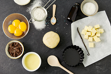 Image showing dough, baking dish and cooking ingredients