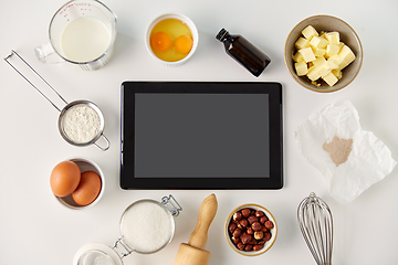 Image showing tablet computer and cooking ingredients on table