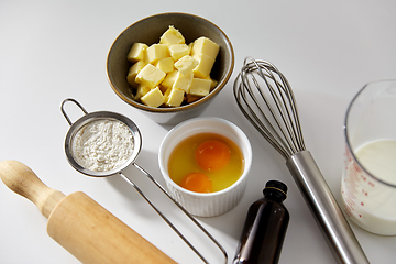 Image showing rolling pin, butter, eggs, flour, milk and whisk