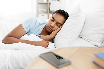 Image showing indian man sleeping in bed at home