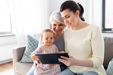 Image showing mother, daughter and grandma with tablet pc